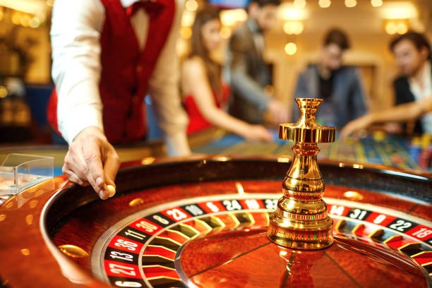 Live dealer at Kembang Kempis table showing card placement and betting area on direkturtoto 2 platform